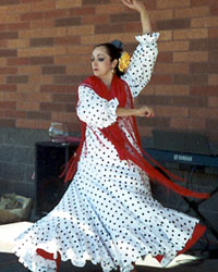 female Flamenco dancer in white dress